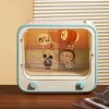 Série THE MONSTERS Chyť mě, když mě máš rád – světelná reklamní krabička na televizi